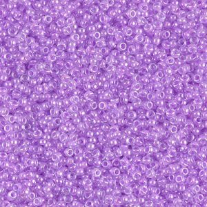 Miyuki, круглый 15/0 (RR-0222). Прозрачный кристалл с фиолетовой линией (Violet Lined Crystal).
