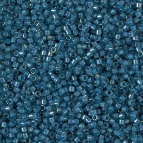 MIYUKI Delica 11/0 DB-2384. Цвет: прозрачный с бирюзово-синим прокрасом (FANCY LINED TEAL DK BLUE). 10г